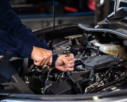 mechanic-hand-using-wrench-repair-engine-car-service mechanic-hand-using-wrench-repair-engine-car-service